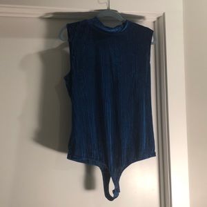 Bright blue body suit